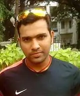 Rohit Sharma in nike T-shirt and with goggle on his head