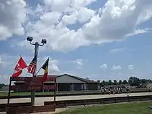 Annawan's Rolle Bolle courts in Howe's Park. A sign declares the courts as the location of the Rolle Bolle World Tournament.