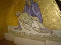 Pieta in mosaic in entrance to Romagne-sous-Montfaucon German War Cemetery.