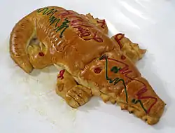 Image 44Roti buaya, crocodile-shaped bread is often served in festive occasions. (from Jakarta)