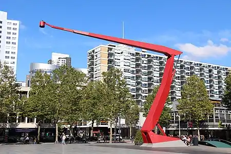 Schouwburgplein in Rotterdam, Netherlands, by Adriaan Geuze (1996). It is an example of the revitalization of a square that was once empty and dominated by concrete. The planned, large greenery of the area is visible.