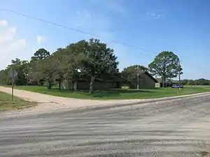 Residence and unused church on FM 1300 at CR 393