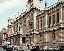 6 Burlington Gardens, on the south side of the street. In use by the Royal Academy of Arts, it includes statues by Joseph Durham.