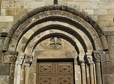 Detail of the tympanum and columns of the south portal.