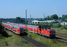 Push-pull train of the Rostock S-Bahn (right) in Warnemünde Werft