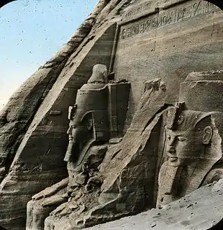 View of the partially excavated Great Temple from the right, with a person for scale