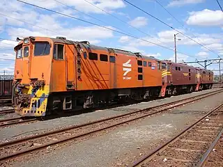 No. E1104 in Spoornet orange livery at Ladysmith, 5 August 2007