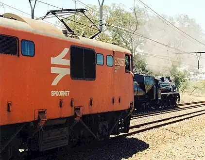 No. E2057 in Spoornet orange livery at Chieveley, KwaZulu-Natal, c. 1999