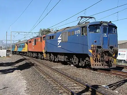 No. E1175 in Spoornet's orange era Blue Train livery, approaching Bellville, Cape Town, 19 March 2007