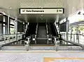 Entrance B escalators.