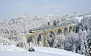 Historic Voralpen Express push-pull trainset (used until 2019) on Wissbach Viaduct near Degersheim