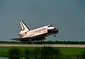 STS-105 lands at the Shuttle Landing Facility, 22 August 2001.