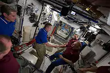 Ham and Kotov shake hands at the farewell ceremony.