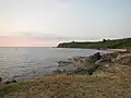 The golf course and the far lighthouse at the Wallace Air Station