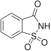 Saccharin, a cyclic sulfonamide that was one of the first artificial sweeteners discovered