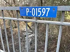 Sign on Bridge reinforced concrete girder bridge panel P-01597 (1951), chemin des Moulins