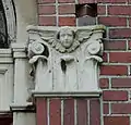 Cherub on the front of the parish house