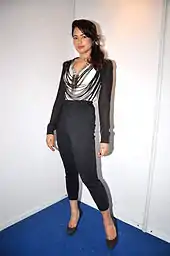 Image 18Indian actress Sameera Reddy wearing contrasting black and white top (from 2010s in fashion)