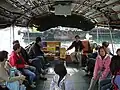 Inside a sampan being used as public transportation between Aberdeen & Ap Lei Chau Island. Note the Octopus Card scanner in the middle.