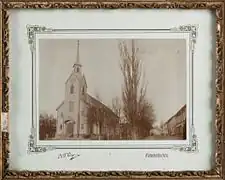 Exterior of the first church (1872-1900)