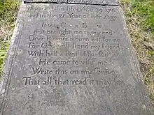 Photo of the grave of Sarah Smith showing the infamous accusation of murder.