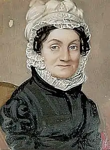 Drawing of a woman in a Quaker white cap, wearing a dark dress with a large lace ruff at the neck.