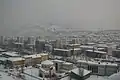 Winter panorama of Grbavica today, with an orthodox church in the foreground and the British embassy in the background