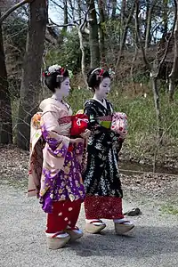 Two Kyoto maiko walking