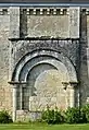 Former side portal of the church (12th-15th centuries) in Savigné