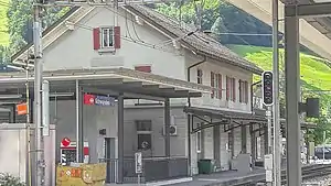 Two-story building with gabled roof