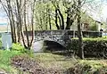 Stone bridge across Mavelščica Creek