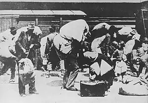 Expelled Serbs marching out of town