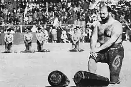 Shaban Jafari during the performance of Pahlevani and zoorkhaneh rituals in Amjadieh Stadium