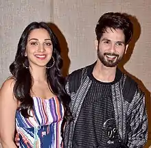 Shahid Kapoor and Kiara Advani are posing for the camera