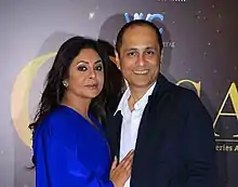 A photograph of Vipul Amrutlal Shah and Shefali Shah looking towards the camera