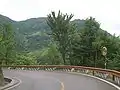 Hairpin turns are equipped with mirrors on the well-maintained section south of Yazikou Junction (main access to Shennongjia National Nature Reserve)