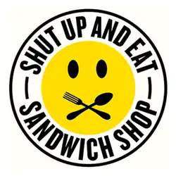 Circular logo with the text "Shut Up and Eat" and "Sandwich Shop"