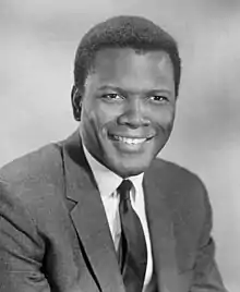 Black and white photo of Sidney Poitier in 1963