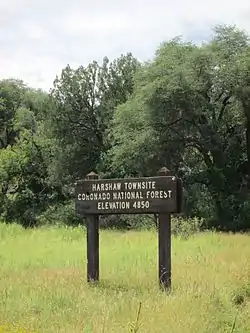 A sign marking the location of the Harshaw townsite.