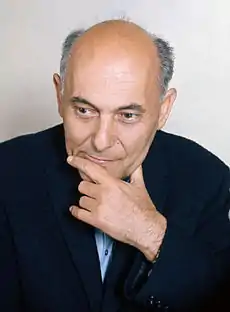 portrait of a middle aged man, clean shaven and bald