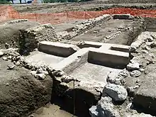 Top view of four quadrangular tanks and their masonry.