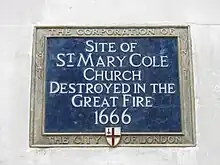 Blue historic plaque on site of St. Mary Cole Church which burnt down in Great Fire of 1666