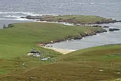 Skaw from the Ward of Norwick The most northerly house in Britain in the foreground and the Holm of Skaw beyond.