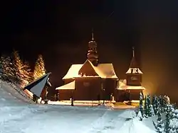 Wooden church of St. Joachim in Skawinki by night