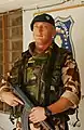 Slovak soldier stands guard in front of the Multinational Division-Central South headquarters at Camp Echo, Iraq, Oct. 5, 2006,