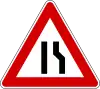 Road narrows on right side