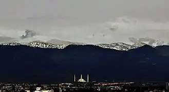 The mosque and Snow-capped Margalla Hills