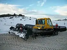 A snow grooming machine in Perisher