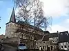 Kerk Saint-Roch, waaronder de toren en het ommuurde kerkhof