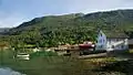 View of boathouses along the fjord